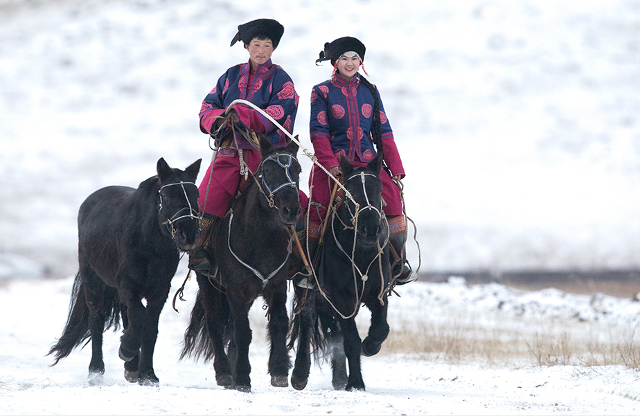 mongolian couples on horseback